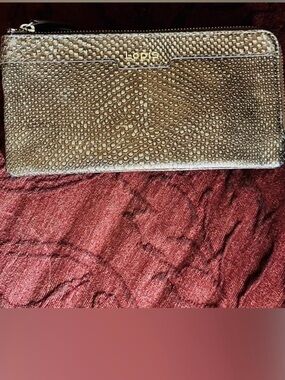 Lodis embossed gold clutch purse wristlet bag